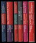 Buchrücken in verschiedenen Farben mit Titeln und Autoren: "NAPOLEON KOMMENTAR", "Das SEPARATRIX Projekt", "KANT KOMMENTARE"., 6 Bücher