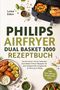 Text: "PHILIPS AIRFRYER DUAL BASKET 3000 REZEPTBUCH." Bild eines Airfryers mit Essen und Zutaten., Buch