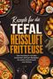 "Rezepte für die TEFAL Heißluftfritteuse", umgeben von Tellern mit gebratenen Gerichten, Brot und Gewürzen., Buch