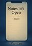 „Notes left Open -Poetry- Yuri Lee“ auf einem Handybildschirm vor blauem Hintergrund., Buch