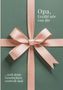 "Opa, Erzähl mir von dir ...weil deine Geschichten wertvoll sind" auf einem Geschenk mit rosa Schleife., Buch