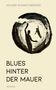 Oben steht "HOLGER SCHWEITZBERGER". Darunter: "BLUES HINTER DER MAUER". Eine Zeichnung von zwei Menschen in Kreisform., Buch
