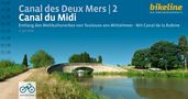 "Canal des Deux Mers | 2 Canal du Midi. Entlang des Weltkulturerbes von Toulouse ans Mittelmeer - Mit Canal de la Robine." Logo: bikeline. Rechts Wasserlauf, Steinbrücke, Bäume.