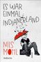 „Es war einmal Indianerland“ und „Nils Mohl“. Ein junger Mann mit rotem Regenschirm sitzt entspannt., Buch