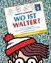 „Wo ist Walter?“ in großen Buchstaben, umgeben von bunter Menschenmenge. Ein markanter Mann mit Mütze sichtbar.
