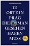 "Jörg Dauscher: 111 Orte in Prag die man gesehen haben muss." Auf blauem Hintergrund mit astronomischem Uhr-Motiv., Buch