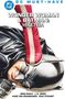 DC Must-Have. Wonder Woman & Batman: Hiketiea. Ein roter Stiefel steht auf Batmans Kopf, der schmerzverzerrt lächelt., Buch