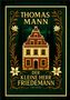 “Thomas Mann, Der kleine Herr Friedemann, Liwi Verlag.” Ein illustriertes Gebäude mit floralen Verzierungen auf grünem Hintergrund.