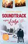 „Kristina Lagom: Soundtrack unserer Liebe. (K)ein Rockstar zu Weihnachten.“ Szene von Winterlandschaft, Paar im Schnee., Buch