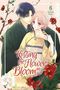 Text: "Kissing the Flower in Bloom", "6", "Samako Natsu". Illustration: Ein Paar in traditioneller japanischer Kleidung umgeben von Blumen., Buch