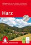"60 Touren rund um den Brocken – Harz. Landschaft mit dicht bewaldeten Hügeln, Dorf im Tal, ROTHER WANDERFÜHRER-Logo.", Buch