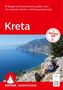 "77 Touren auf Griechenlands größter Insel – die schönsten Küsten- und Bergwanderungen Kreta". Eine Frau sitzt auf Felsen, Blick aufs Meer.