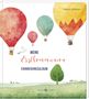 "MEINE Erstkommunion ERINNERUNGSALBUM" steht in der Mitte. Heißluftballons und eine Taube über einer grünen Landschaft.
