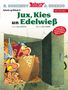 Titel: "Jux, Kies un Edelweiß". Zwei fröhliche Figuren betrachten einen Käselaib, umgeben von Münzen., Buch