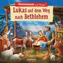 "Adventskalender mit Poster: Lukas auf dem Weg nach Bethlehem." Eine Illustration mit einer Krippenszene und Tieren., Buch