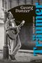 Aufschrift "Georg Danzer", "Träumer", "Texte und Lieder". Ein Mann lehnt mit Gitarre an einem Laternenpfahl., Buch
