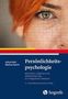 Buchtitel: "Persönlichkeitspsychologie". Autoren: Julius Kuhl, Markus Quirin. Ein Auge und Teil eines Gesichts, hogrefe-Logo.