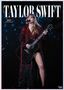 „TAYLOR SWIFT 2027 OFFICIAL CALENDAR“ steht in Großbuchstaben oben. Frau mit rotem Glitzeroutfit und Gitarre.