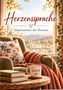 "Herzenssprache: Impressionen des Herzens" von Heidrun M'Butu. Gemütlicher Sessel mit Kissen, Tasse "Wertvoll"., Buch