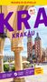 Text "Krakau" in lila Großbuchstaben, gelber Rand oben. Sicht auf ein historisches Gebäude mit zwei Türmen., Buch