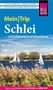Titel: "Mein Trip Schlei mit Schleswig und Eckernförde". Oben zwei Segelboote auf einem Fluss, grüne Landschaft., Buch
