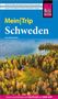 Text über Schweden-Reiseführer. Holzhaus am Seeufer mit Boot im Vordergrund. Klarer Himmel, ruhige Wasseroberfläche., Buch