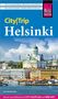 "City|Trip Helsinki" mit Texten über Sehenswürdigkeiten. Bild einer Uferansicht mit Dom und farbigen Gebäuden.