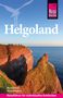 Text: "Helgoland", "Nicole Funck", "Michael Narten", "Reiseführer für individuelles Entdecken". Klippen mit Meer im Hintergrund., Buch