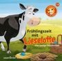 "Frühlingszeit mit Lieselotte", Illustration mit schwarz-weißer Kuh auf einer Wiese. Eier im Nest, Korb daneben.