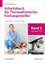 „Arbeitsbuch für Tiermedizinische Fachangestellte“, Band 2. Frau in blauem Kittel mit Hund, daneben Mikroskop., Buch