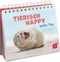 „TIERISCH HAPPY jeden Tag“ steht oben. Ein lächelndes Seehundjunges rollt lachend im Sand. Unten: „Paulus Vennebusch“., Buch