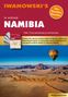 Aufschrift: "IWANOWSKI'S NAMIBIA". "Erleben Sie abenteuerliche Safaris". Ein Heißluftballon über einer Wüstenlandschaft.