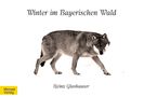 "Winter im Bayerischen Wald", darunter "Heinz Glashauser". Ein Wolf schleicht auf weißem Hintergrund. Links unten gelb: "Morsak Verlag"., Buch