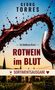 Georg Torres, Ein Mallorca-Krimi, Rotwein im Blut. Rotweinspritzer und Glas vor mediterranem Weingut-Hintergrund., Buch