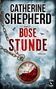 "CATHERINE SHEPHERD", "BÖSE STUNDE", "THRILLER". Eine alte Taschenuhr mit Blut gefüllt, Kette rechts oben, düstere Stimmung., Buch