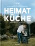 "HEIMAT KÜCHE 2" und "coming soon..." über einem nebligen Wald. Oben steht "team tietge.", Buch