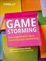 "GAME STORMING" in weiß auf pinkem Hintergrund. Text darunter über Ideenfindung. Bunte Notizzettel im Hintergrund.