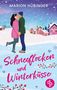 "Schneeflocken und Winterküsse" von Marion Hübinger. Ein Paar küsst sich im Schnee, bunte Häuser im Hintergrund., Buch