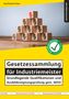 "Gesetzessammlung für Industriemeister" mit Holzklötzen und Paragraphenzeichen, oben roter Paragraph, grüner Prüfungsstempel., Buch