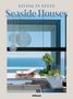 "LIVING IN STYLE - Seaside Houses" und "teNeues". Moderne Terrasse mit Meerblick, Liegestuhl und Pflanzen., Buch