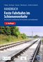 Handbuch „Feste Fahrbahn im Schienenverkehr“, 3. Auflage. Bahngleise führen entlang einer grünen Landschaft.