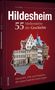 Eine Illustration zeigt den Titel "Hildesheim: 55 Meilensteine der Geschichte" mit Fachwerkhäusern im Vordergrund.