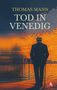 "THOMAS MANN TOD IN VENEDIG." Ein Mann im Anzug und Hut blickt auf Venedig bei Sonnenuntergang., Buch