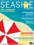 SEASIDE Magazin 10 Jahre. Sylt-Hamburg, Strandbars, Meer erleben, Seeblick, Skydive, Fotowettbewerb 2025. Bunter Sonnenschirm.