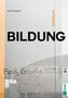 Texte: Ines Wagner, Denkbuch, BILDUNG, "Fuck Schule 20258". Ein Graffiti auf einer Betonwand mit schlichten Farben., Buch