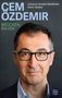 Text: CEM ÖZDEMIR, BRÜCKEN BAUEN von Johanna Henkel-Waidhofer, Peter Henkel. Ein Mann mit Brille und dunklem Haar., Buch