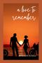 "a love to remember" und "BY SIMON DANIEL". Silhouette eines Paares vor einem Sonnenuntergang am Meer, neben Motorrädern., Buch