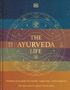 "The Ayurveda Life" von Dr. Bhaswati Bhattacharya. Vielfarbige Streifen mit Symbolen und einem Baum in der Mitte., Buch