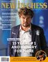 Titel: "NEW IN CHESS". 
Großer Text: "15 YEARS #1 AND HUNGRY FOR MORE". 
Abgebildet ist ein Mann im Anzug mit Schachlogos., Buch