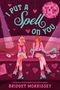 "I Put A Spell On You" in großen Buchstaben, zwei Personen sitzen mit Rollschuhen unter einer Discokugel, rosa Herzen., Buch